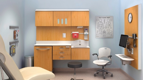 An organized exam room outfitted with Compass furnishings and a Caper chair. 
