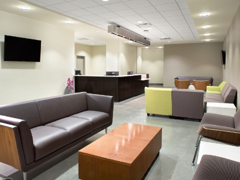 A waiting area features an array of lounge seating styles. 