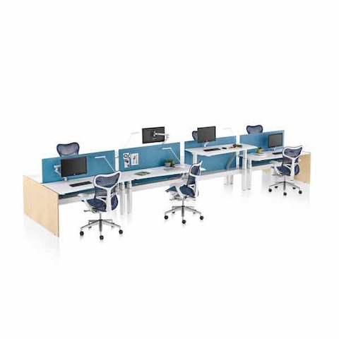 A Renew Link work bench with four workstations on each side and Mirra 2 office chairs.