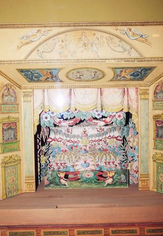 Girard played with paper theaters like this one from Great Britain when he was a child. It could begin to explain his penchant for creating worlds within worlds.
