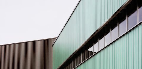Partial exterior view of Herman Miller's PortalMill facility in the UK.