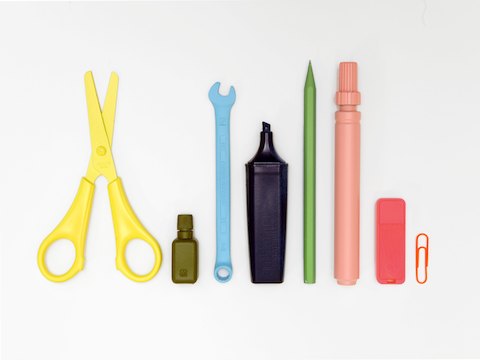 Colorful images of various work tools, including a scissors, marker, flash drive, and paperclip.
