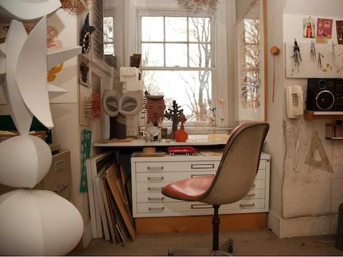 Harper’s workspace looks much the same after decades of use.