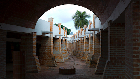 Un pasadizo de ladrillos en las Escuelas Nacionales de Arte en Cuba. Seleccione ir a fotos de viaje del diseñador Don Chadwick.