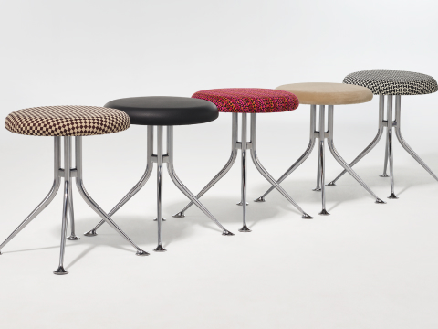 A line of Girard Stools showing the variety of upholstery options. A line of Girard Stools showing the variety of upholstery options.