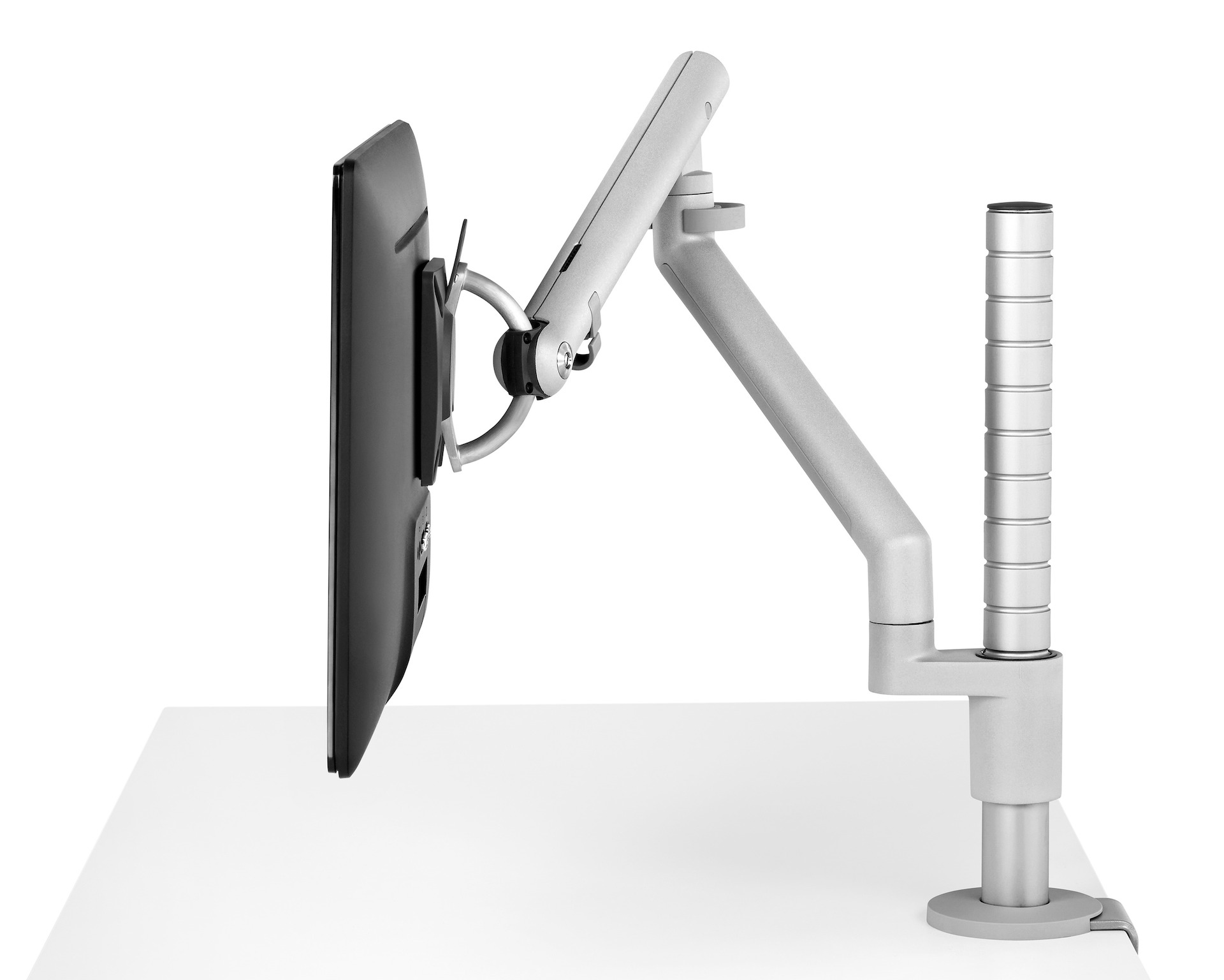 Profile view of a single monitor attached to an adjustable Flo Modular monitor arm