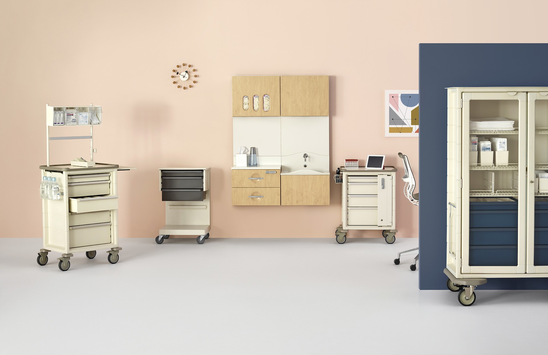 Clinical healthcare environment that includes four procedure/supply carts of various configurations and sizes and Compass system with storage and a sink.