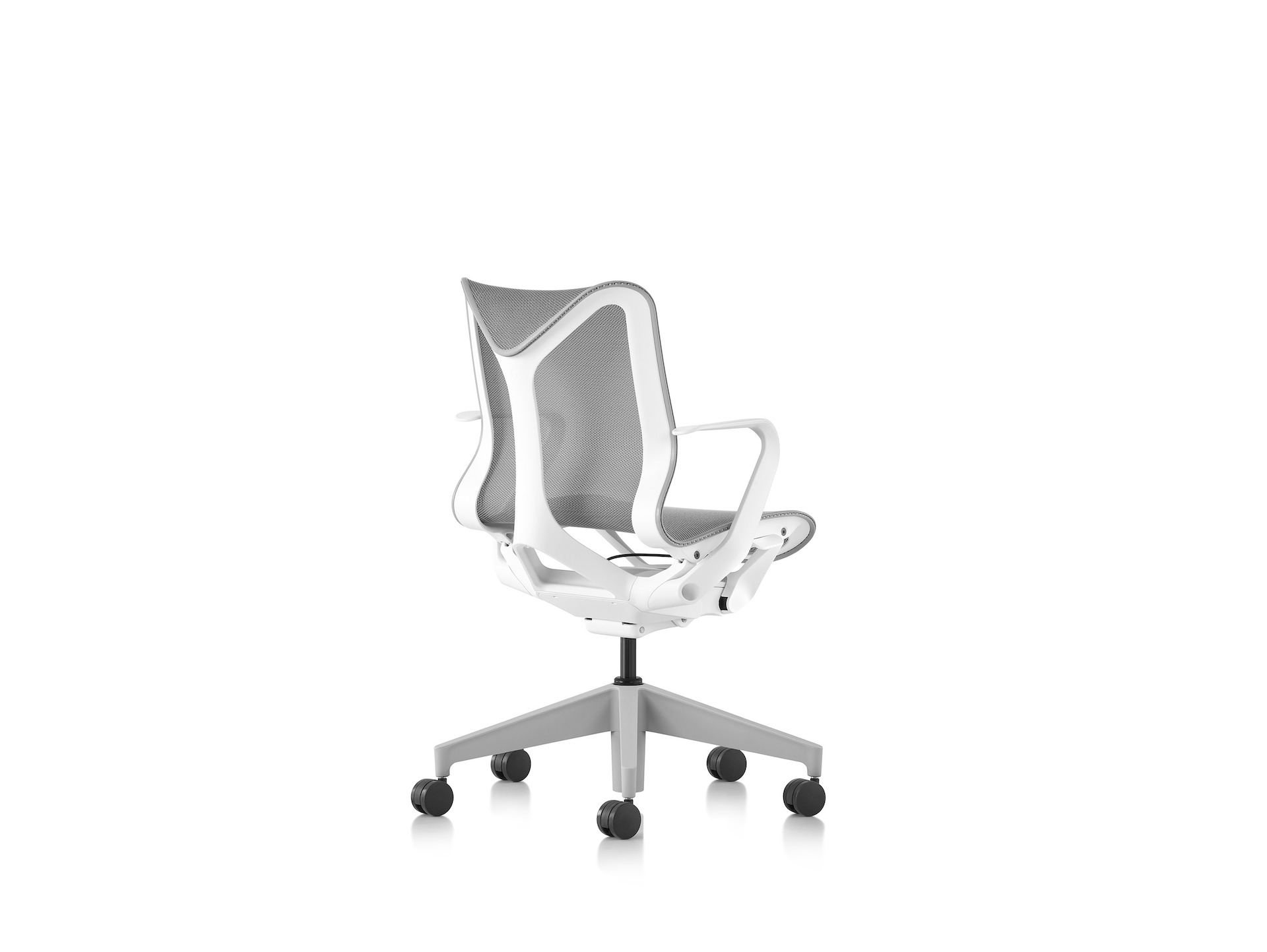Cosm low chair in back angle view in light grey.