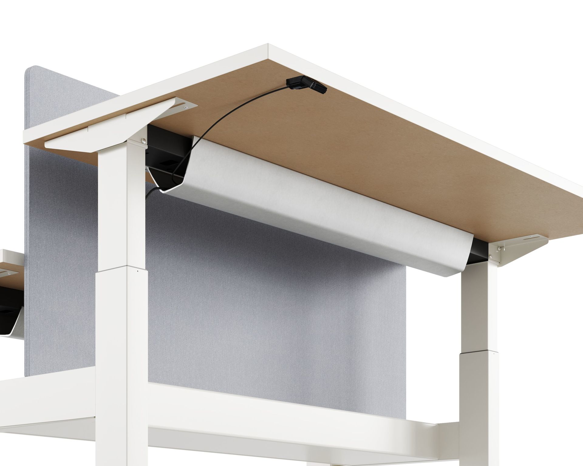 Close-up of standing desk system, Nevi Link, undersurface with a black cable running through the cable tray.
