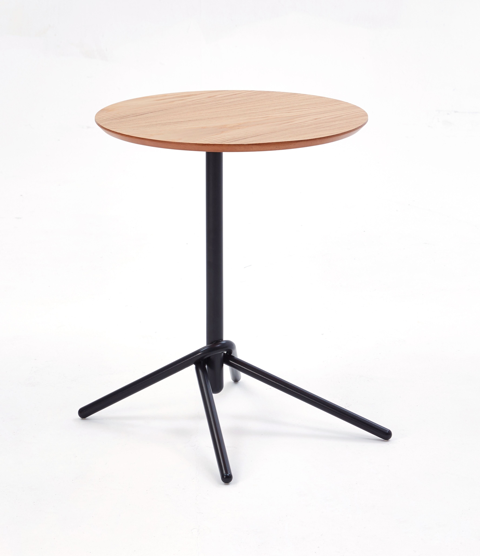 A naughtone Knot Side Table with an oak veneer top and black base.
