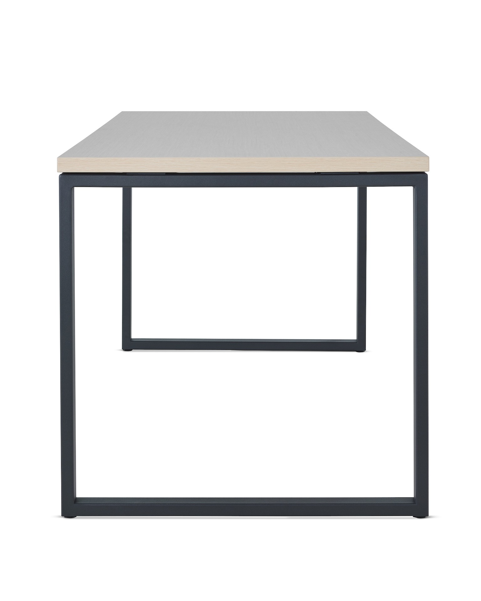 Canvas Metal Desk light wood work surface with black loop legs.