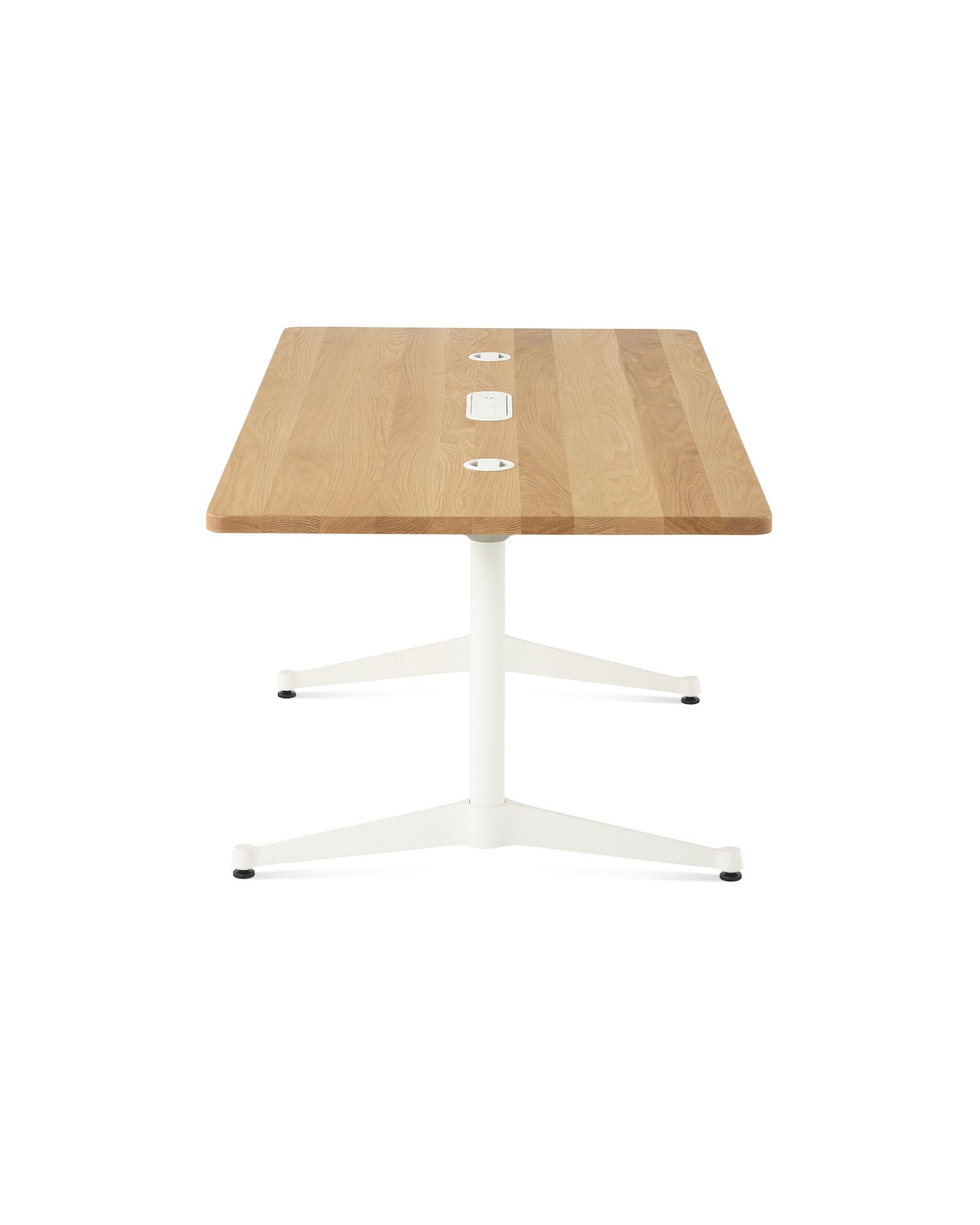 An oak Eames T-Leg conference table with white legs, power access, and routing capabilities.