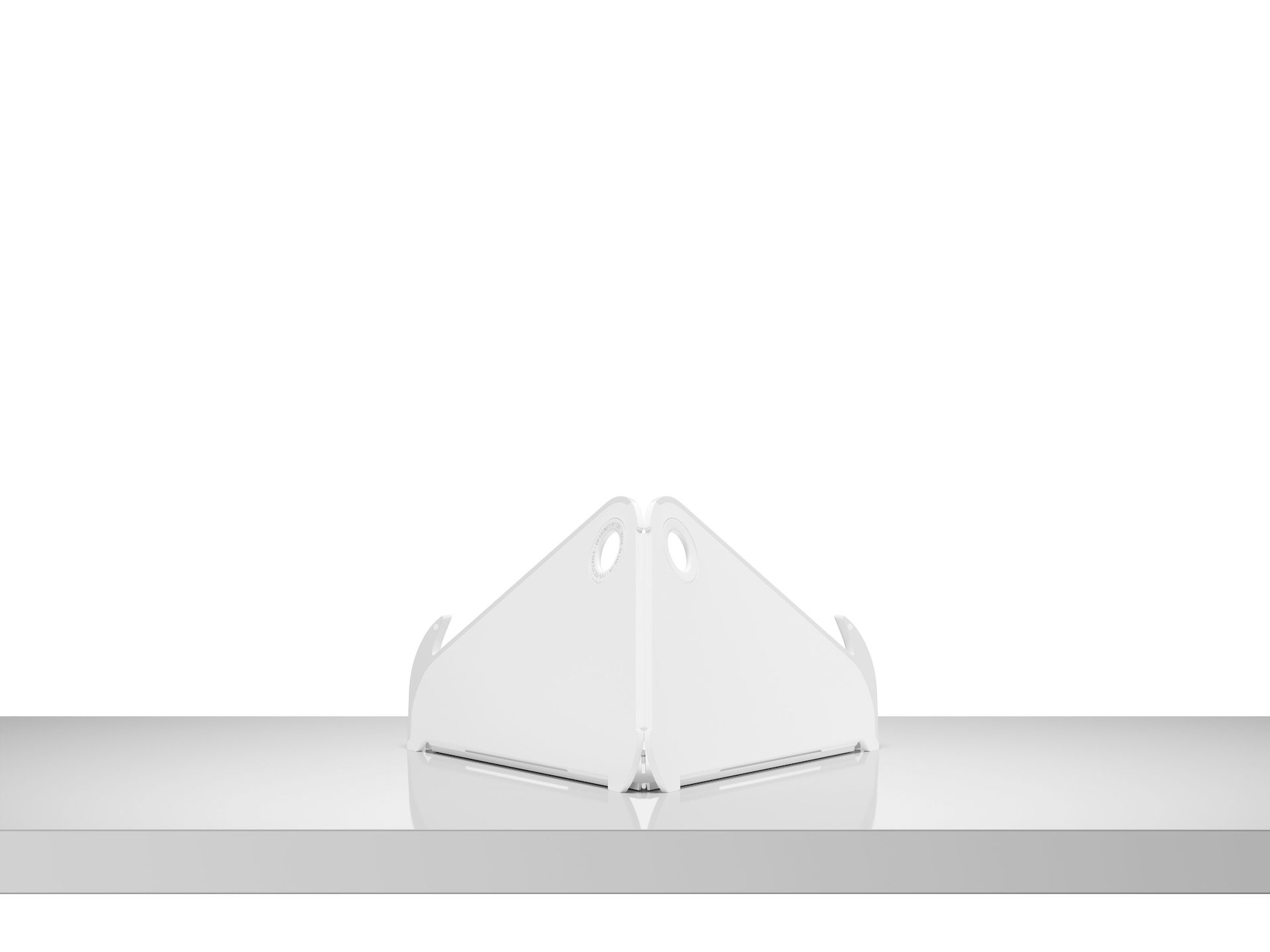 A back view of an open Oripura Laptop Stand on top of a worksurface.