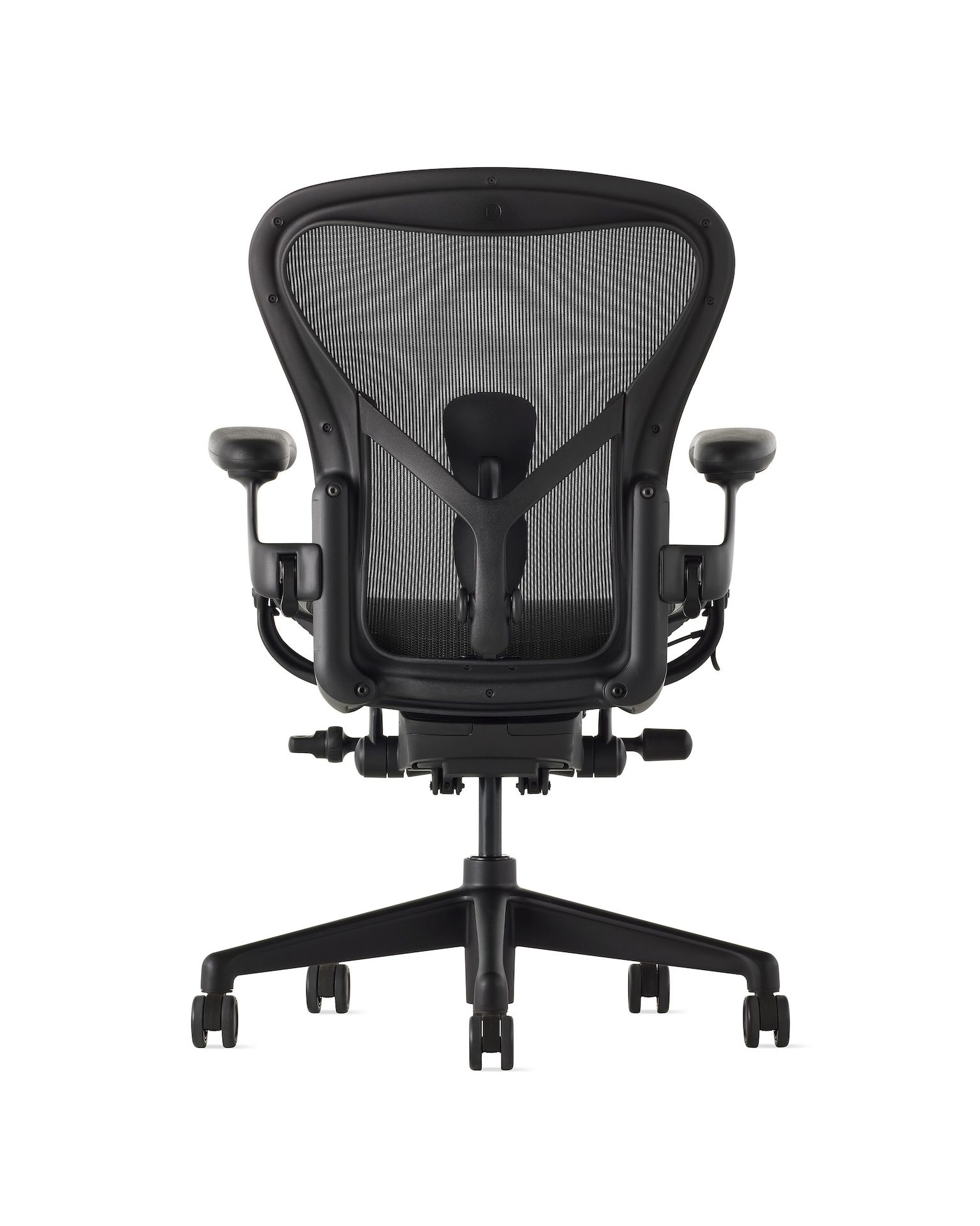 Black matte Aeron Chair on a white background with a 5-star base and ergonomic back support, view of the chair back.