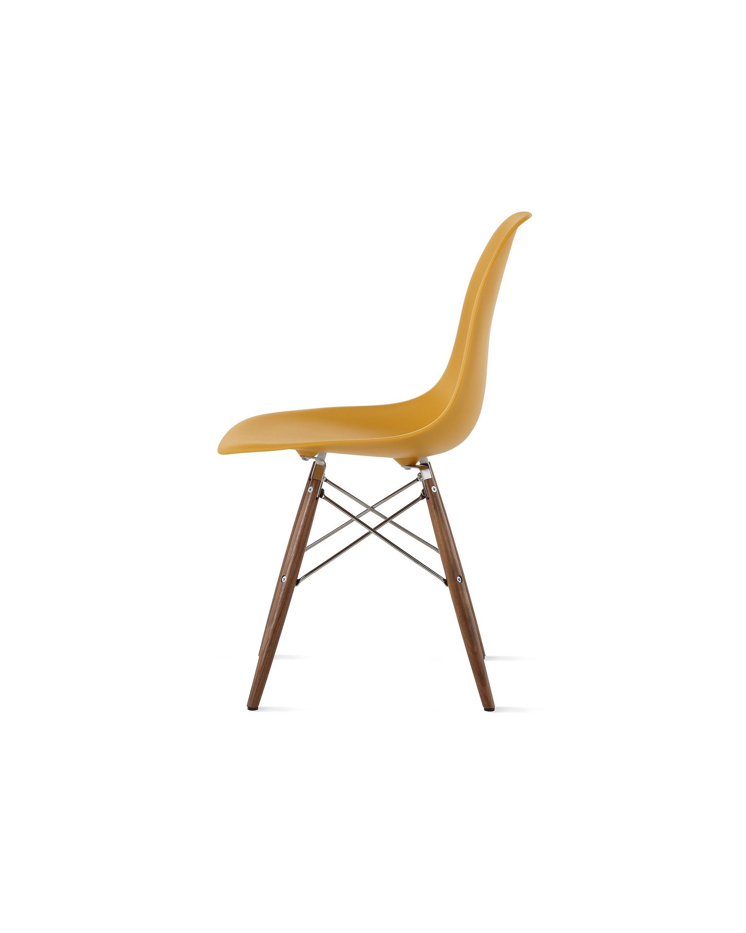Side of deep yellow plastic shell chair on dowel-base legs.