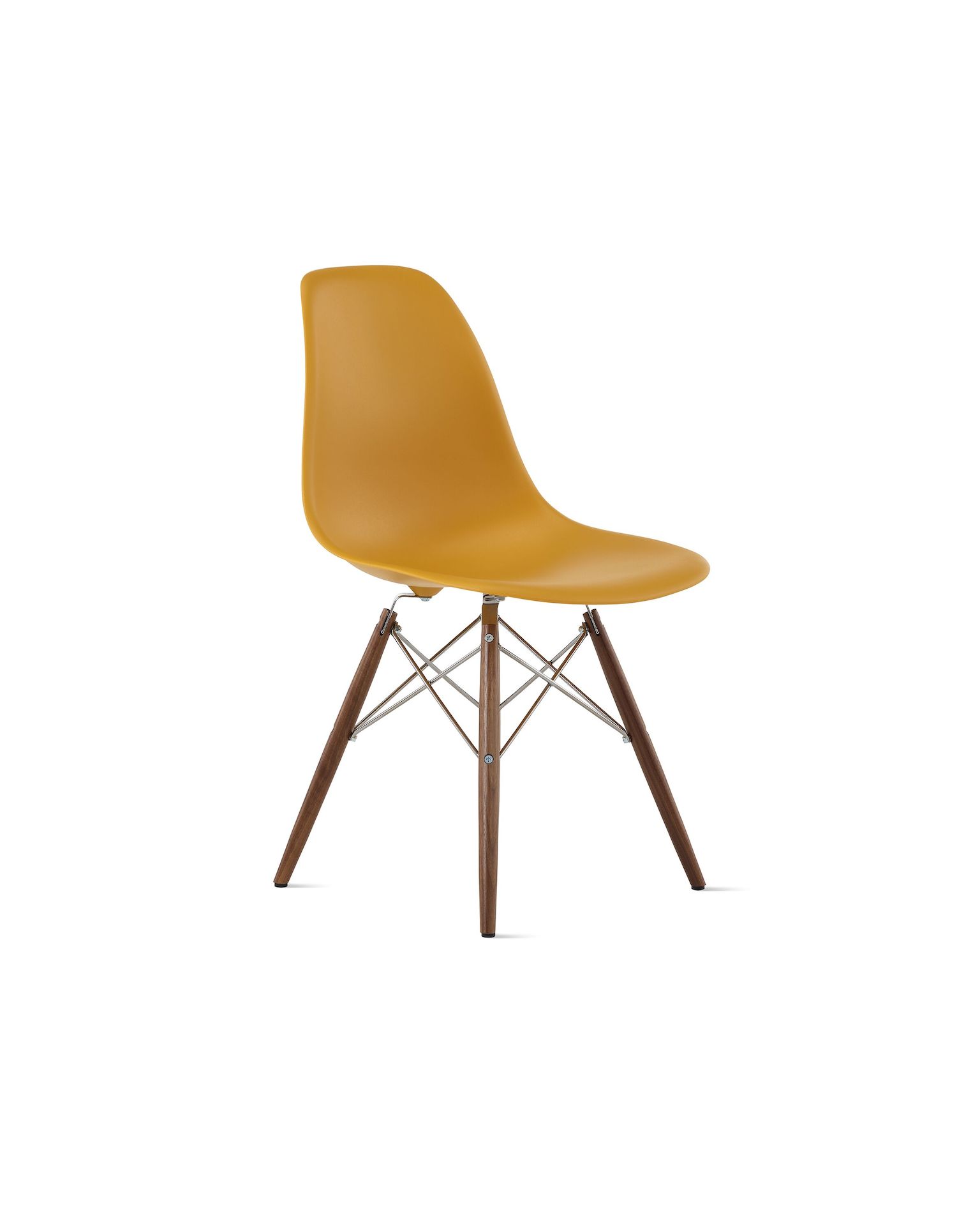 Front of deep yellow plastic shell chair on dowel-base legs.