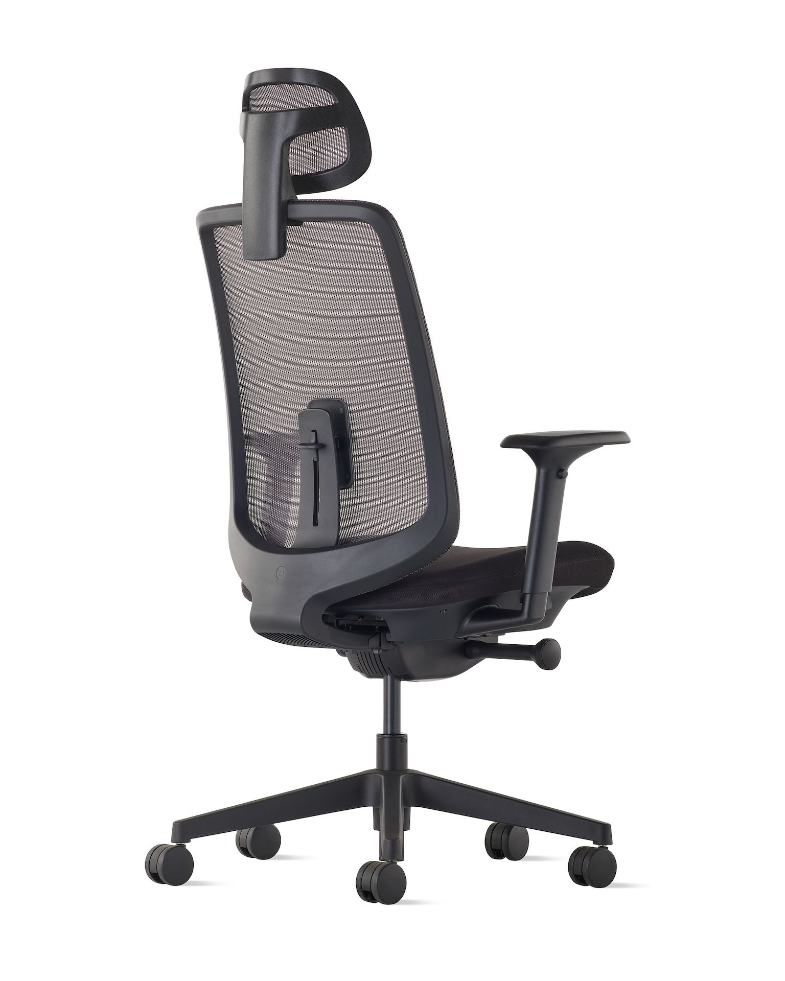 Rear angle view of a Verus chair with a headrest and  black suspension, frame and base.