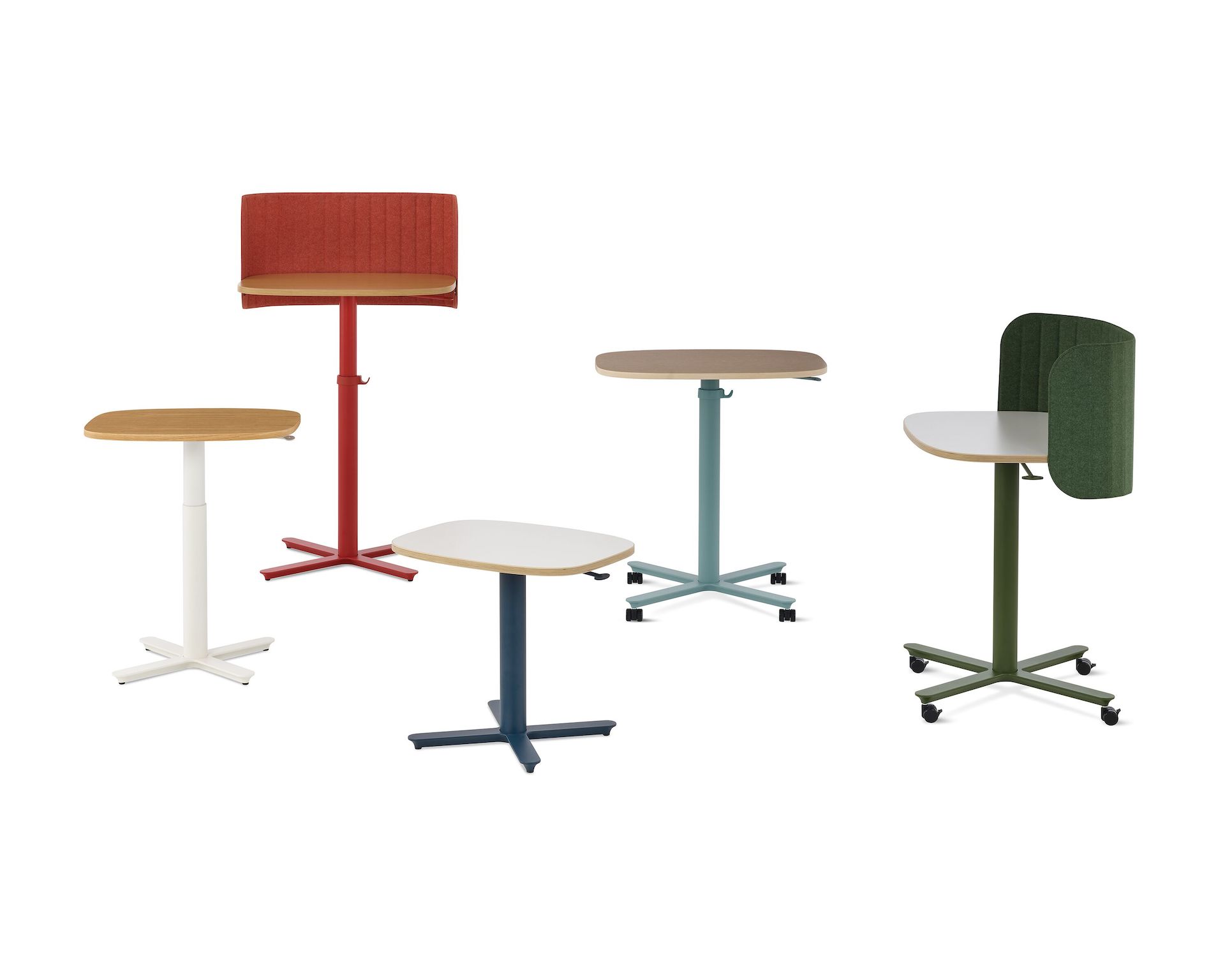 Multiple Passport Work Tables in both small and large size with a variety of base finishes, mix of solid and woodgrain tops, and accessories.