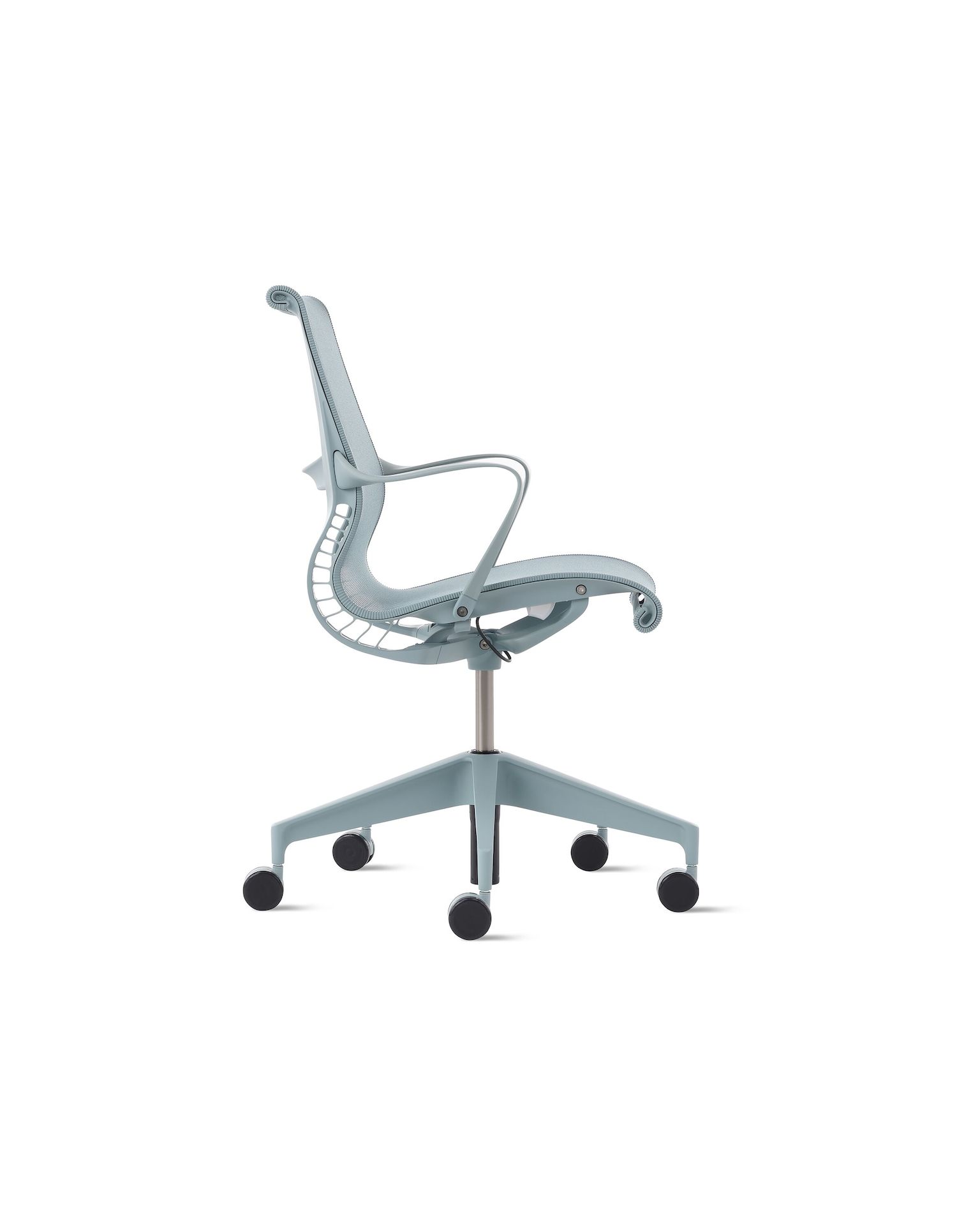 Side view of a Setu chair with fixed arms in light blue.