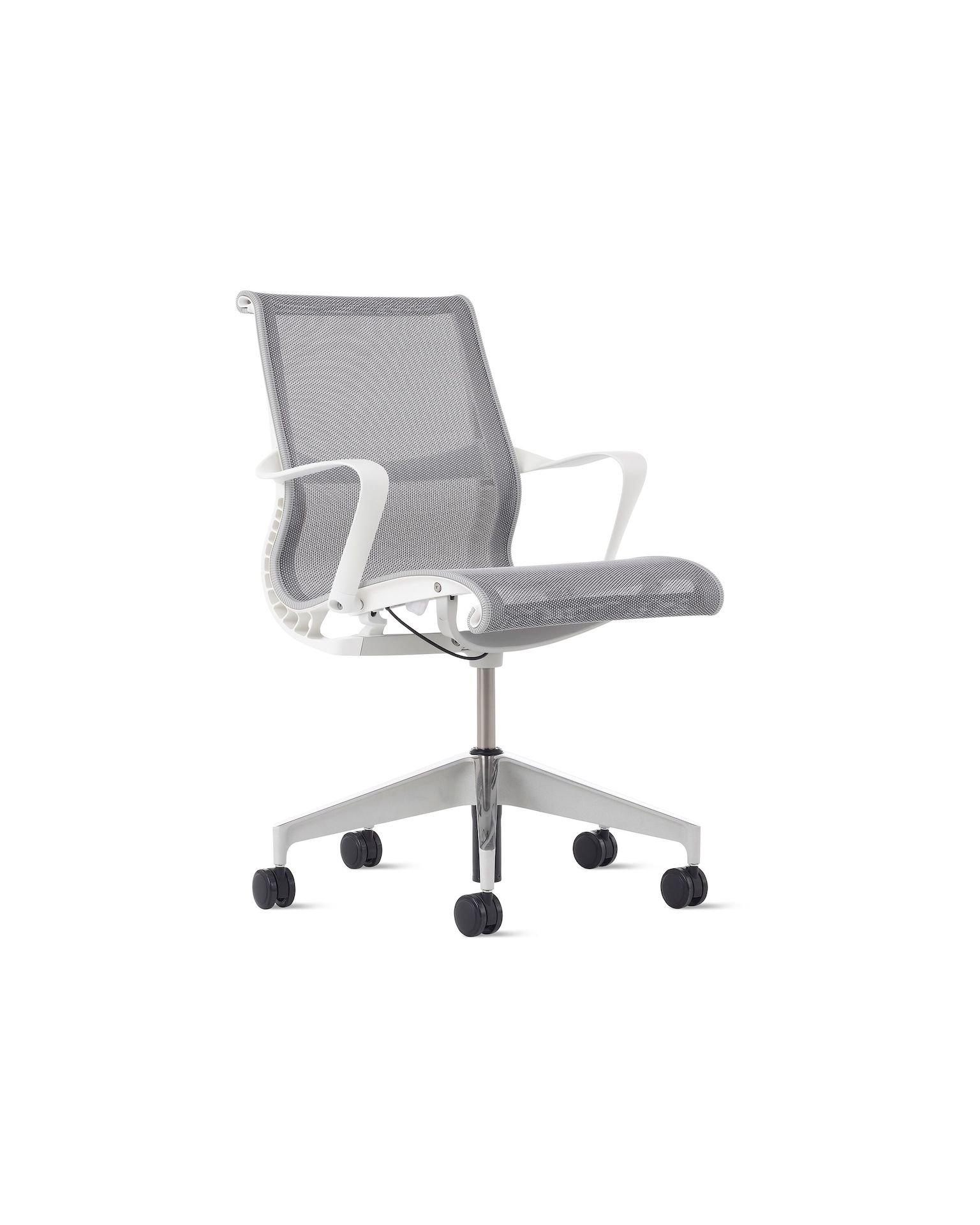 Front angle view of a Setu chair with a white frame, grey suspension and semi polished base.