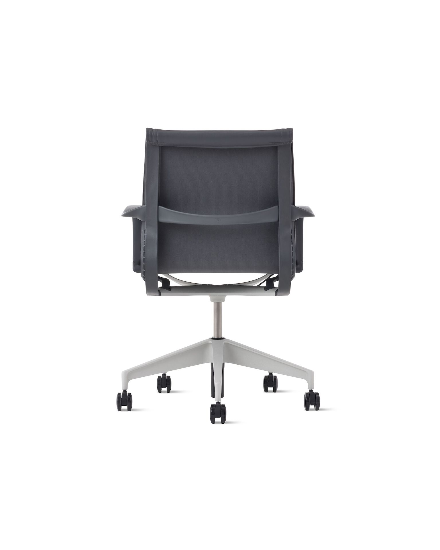 Rear view of a Setu chair with carbon upholstery and frame with a silver alloy base.