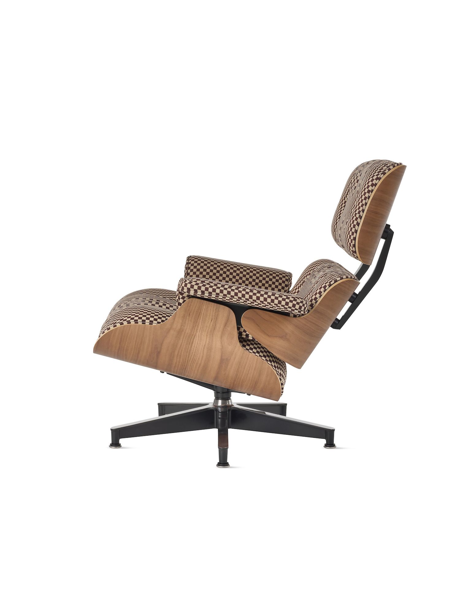 Eames Lounge Chair with brown checker upholstery and walnut shell.