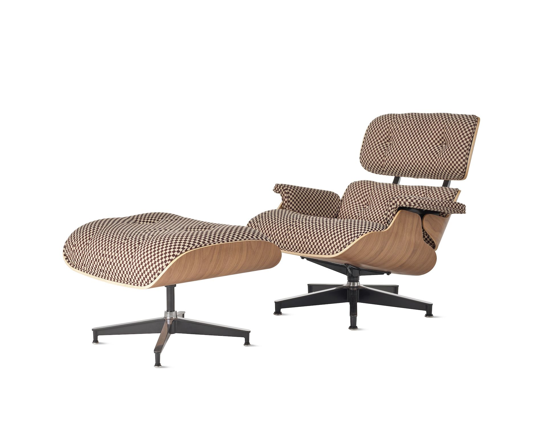 Eames Lounge Chair and Ottoman with brown checker upholstery and walnut shell.