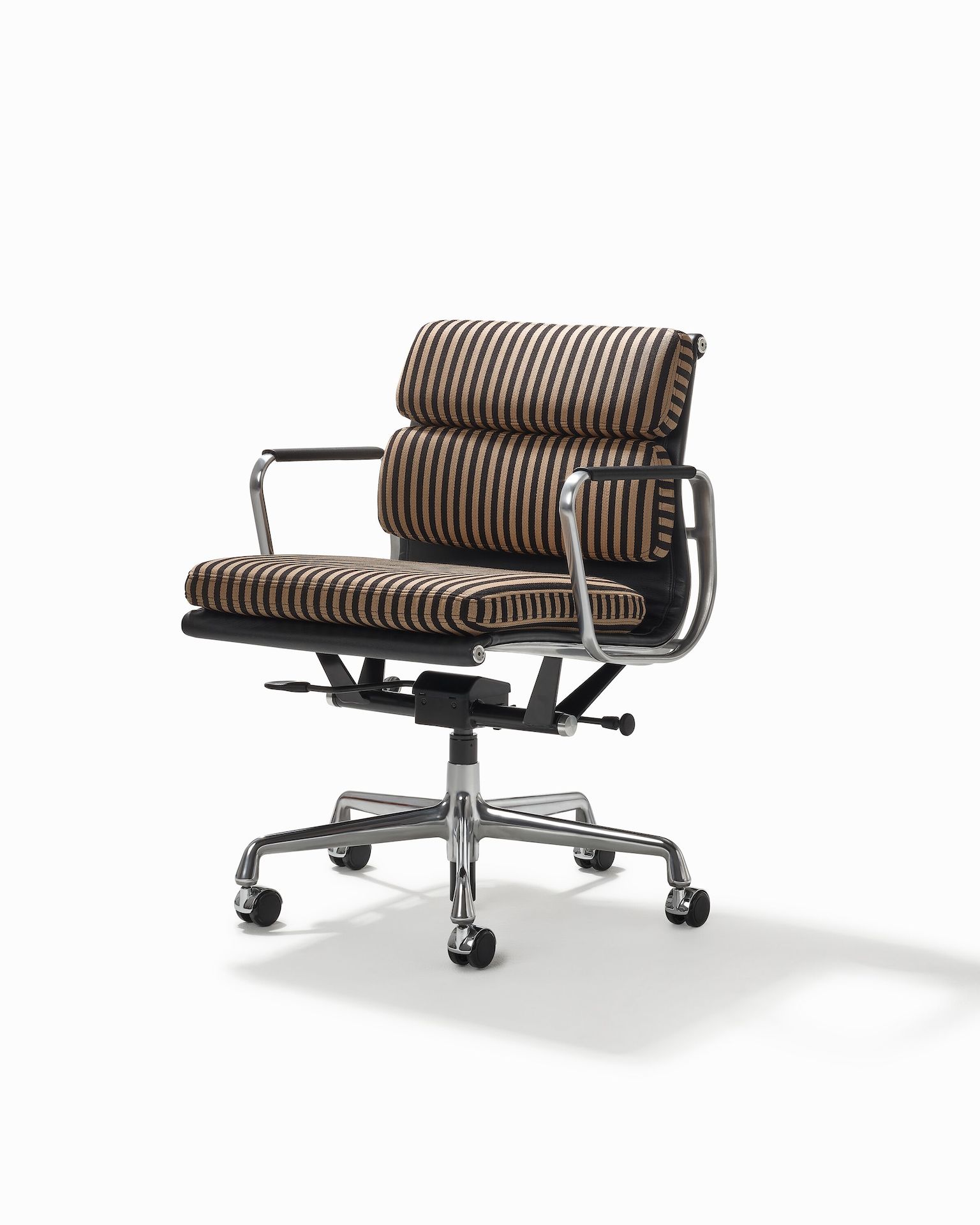 Eames Soft Pad Chair, Management Height in stripe black and tan upholstery.