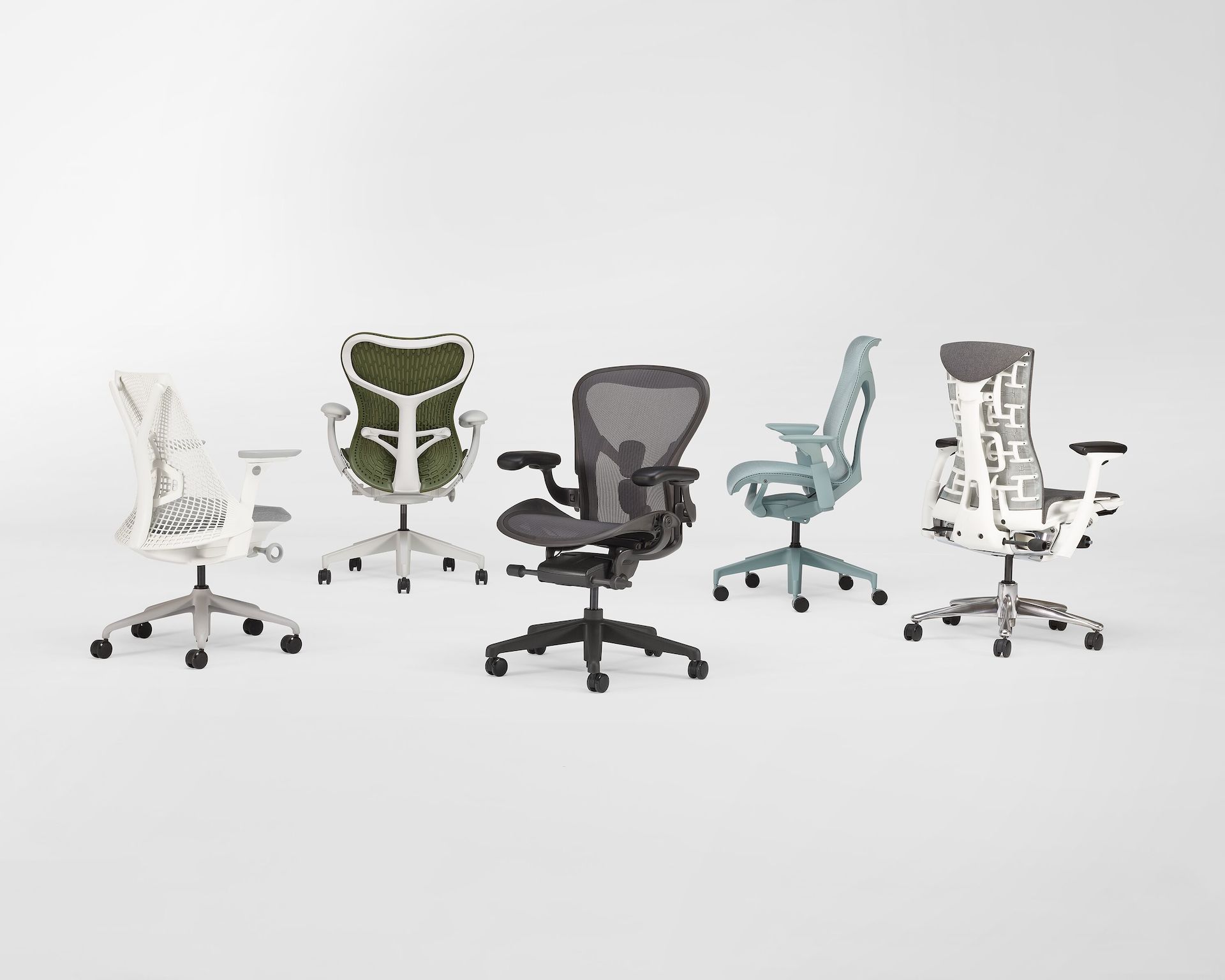 Five high-performance chairs arranged horizontally. Includes Aeron, Embody, Cosm, Mirra 2, and Sayl.