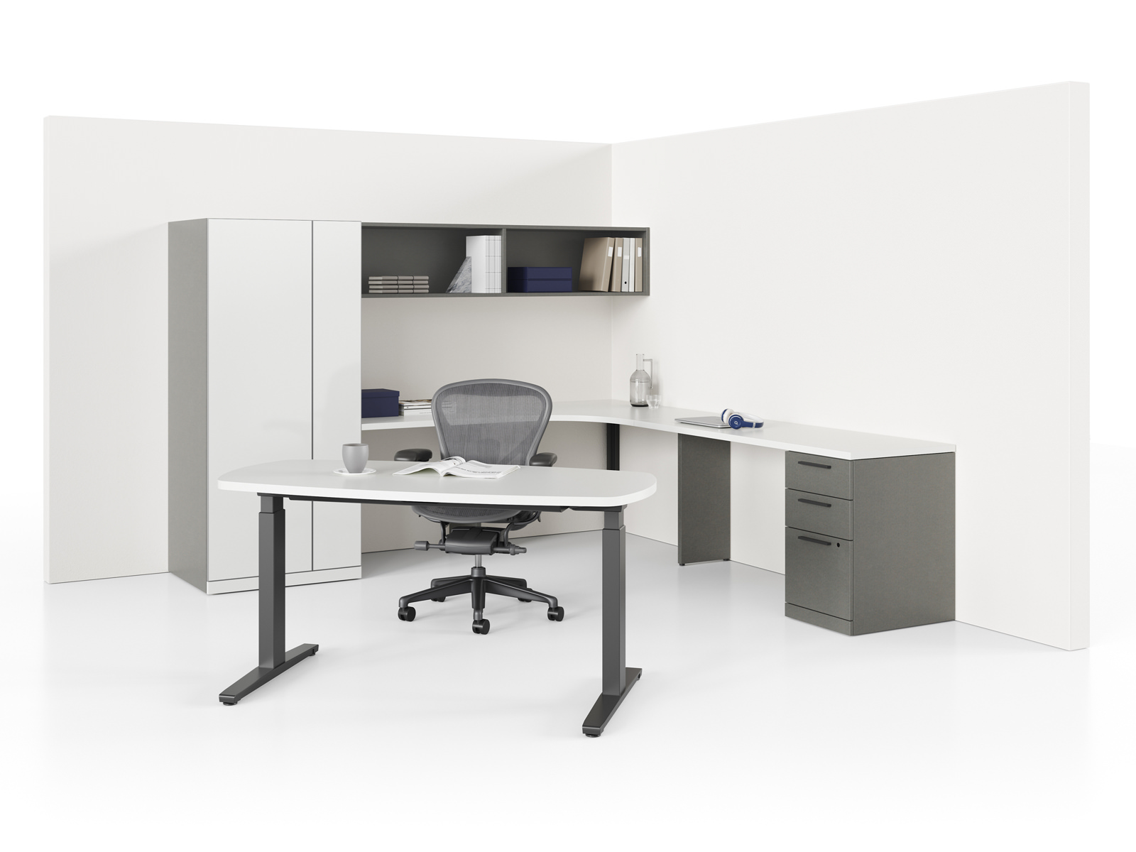 An Aeron office chair sits between a Renew Sit-to-Stand Table in the foreground and an L-shaped Canvas Private Office configuration along the back walls.