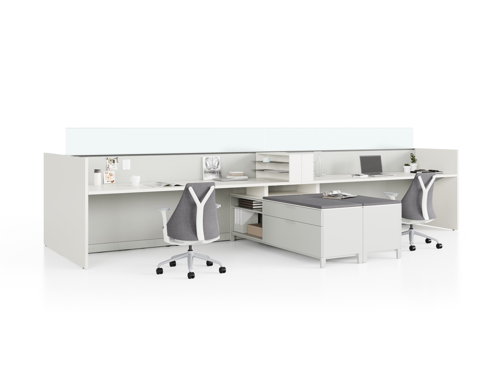 Two grey Canvas Wall workstations with lower storage, glass screens, and Sayl chairs.