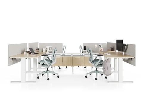 White and light ash Canvas Vista with raised storage, fixed-height desks, gray screens and light-blue Cosm chairs.