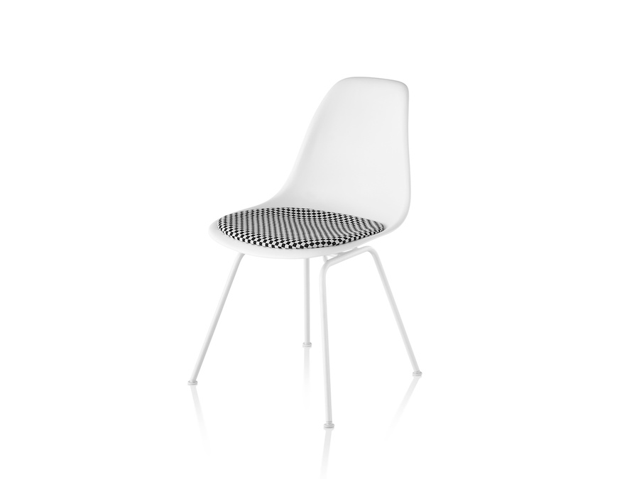 A photo - Eames Moulded Plastic Side Chair–4-Leg Base–Upholstered Seat Pad