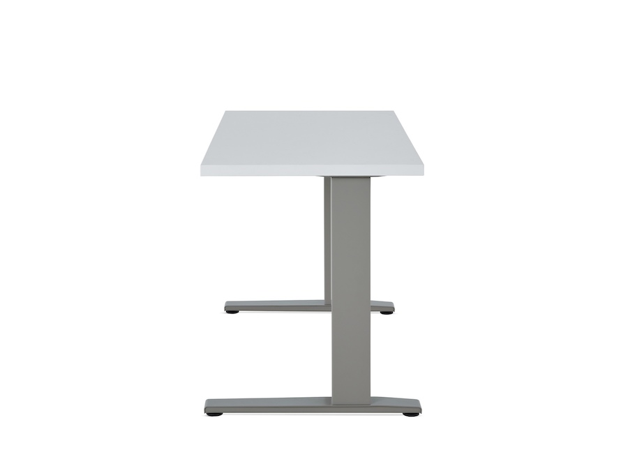 A photo - Motia Sit-to-Stand Table–Rectangular–C Foot