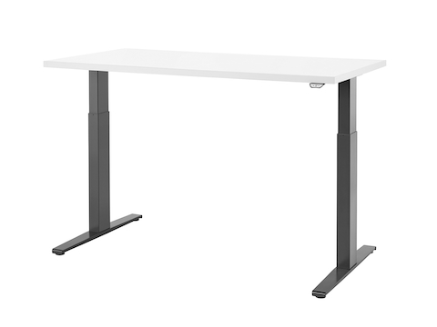 A Motia standing desk with dark gray legs and white work surface raised to standing height.