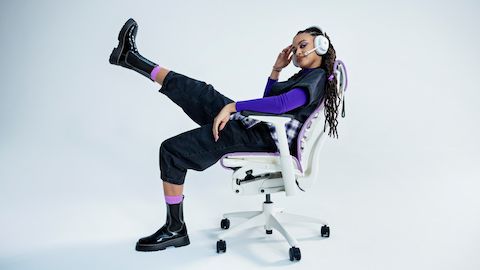 A player sits back in his Embody Gaming Chair, available in the new Galaxy color.