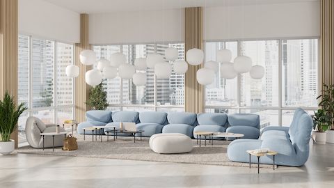 Luva Modular Sofa and Cyclade Tables in a commercial lounge setting