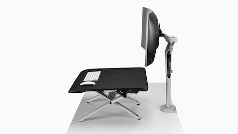 Side profile of Monto sit-stand riser with Ollin Monitor arm