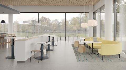 Community socialisation area with OE1 Sit-to-Stand Tables, occasional tables and sofas.