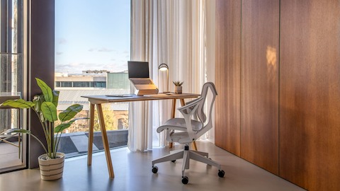 Cosm Chair against a HAY CPH90 desk in a home office environment 