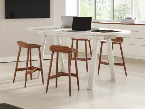 Oval top Boa Table in a huddle studio space setting, counter height with stools and OE1 Agile media wall.