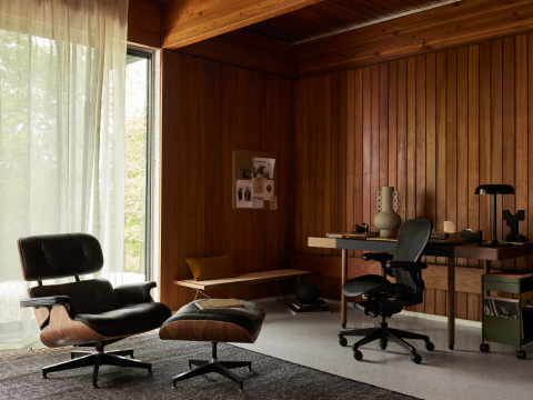 A wooden base office showcasing Eames Lounge Chair and Graphite Aeron.