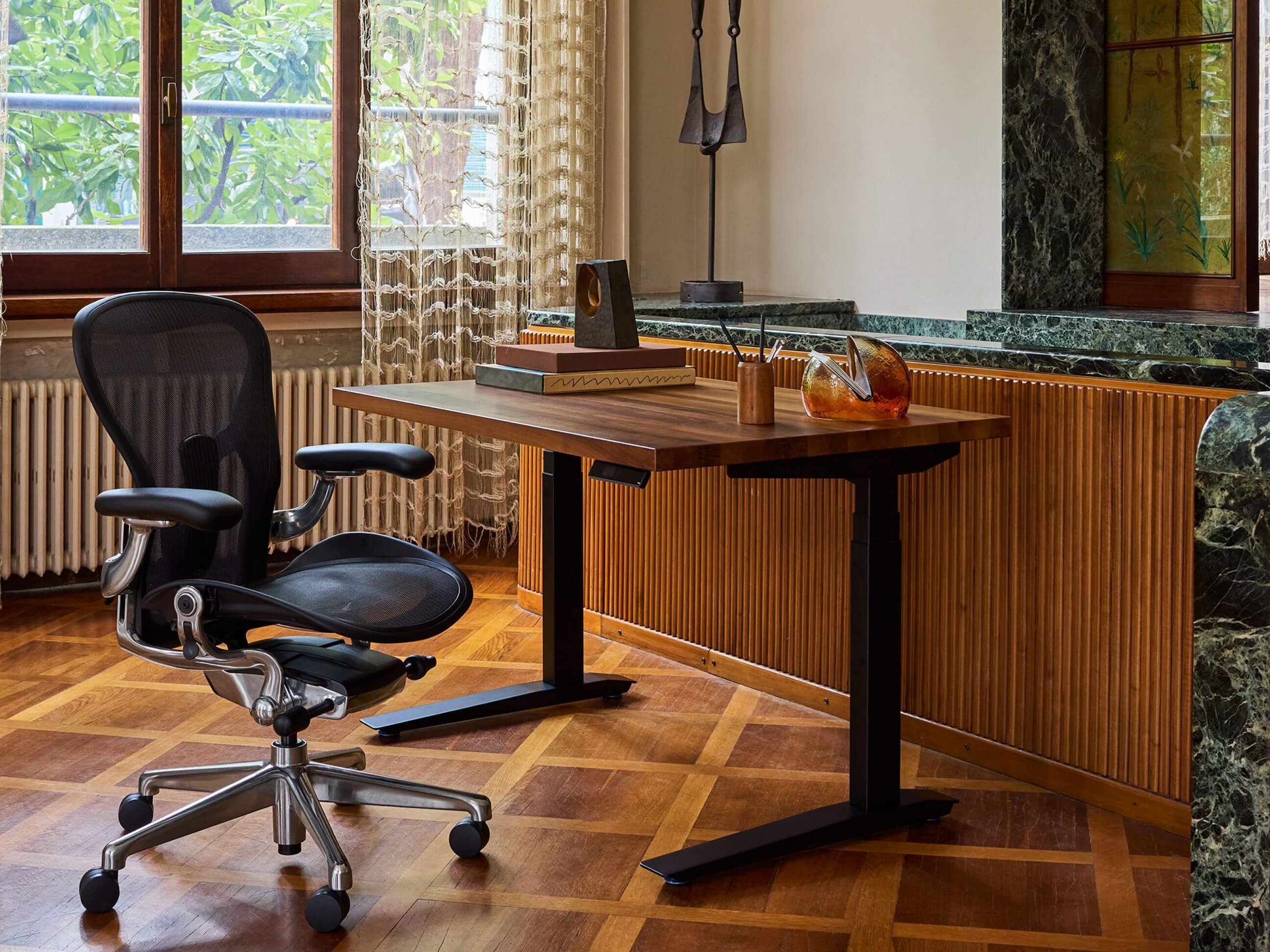 Aeron Chair and Jarvis Standing Desk form the foundation for a happier, healthier home office.