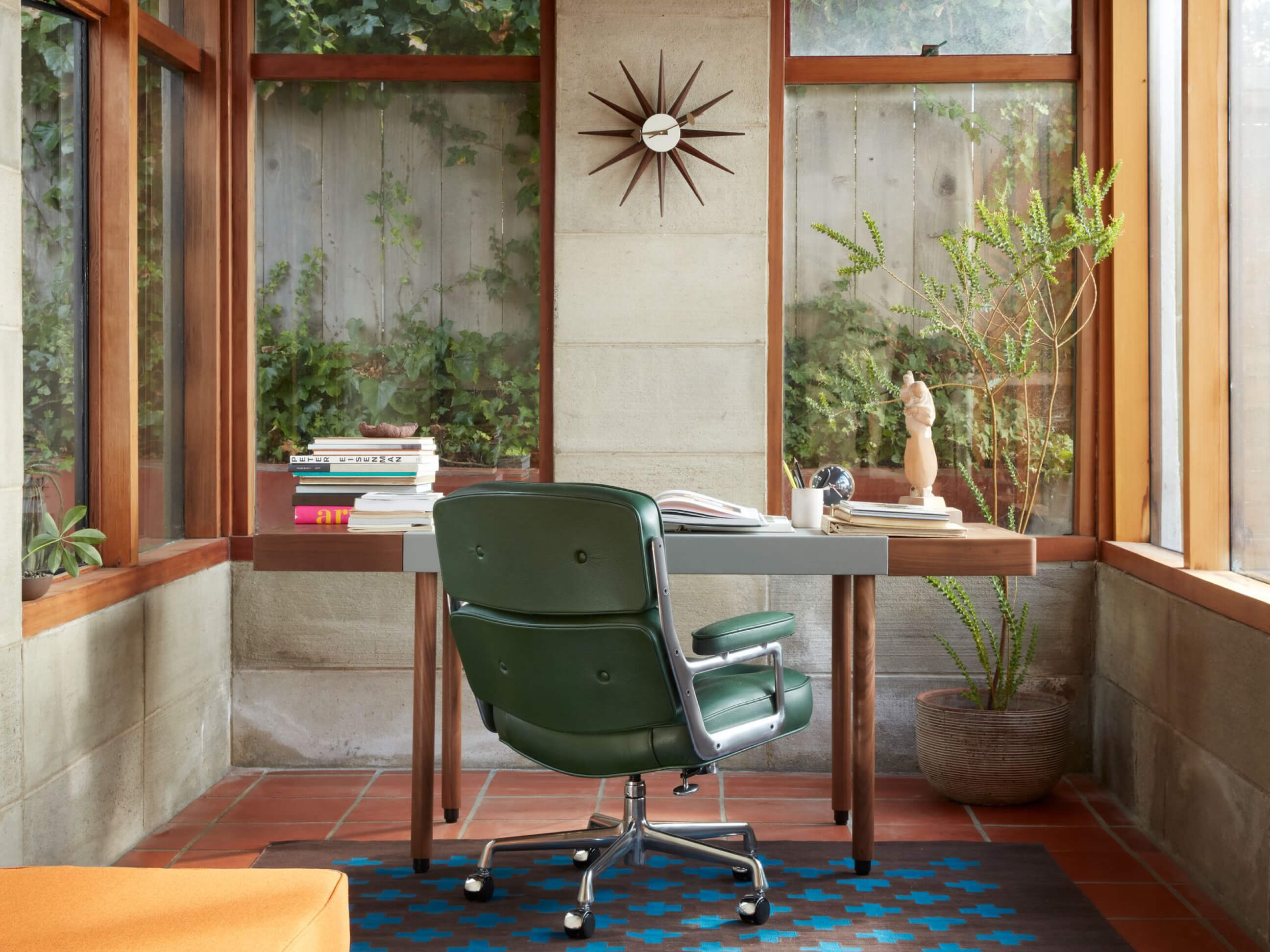 A boardroom classic completes a modern home office: The Eames Executive Lounge Chair is available in our elegant prone leather.