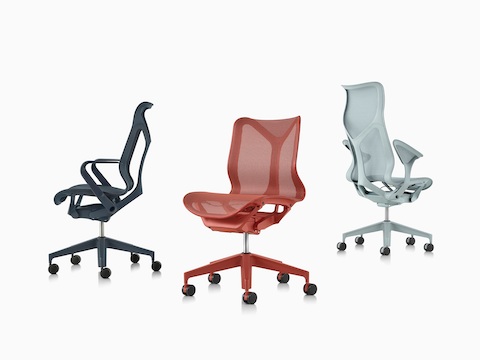 A grouping of Nightfall navy blue, Canyon red, and Glacier light blue Cosm Chairs.