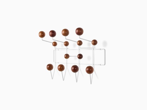Angled view of an Eames Hang-It-All with 14 wood knobs.