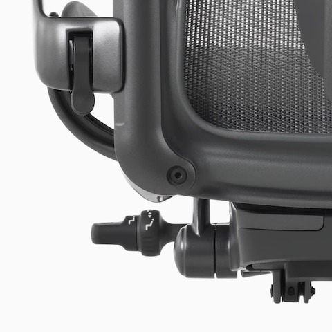 A close up view of the tilt limiter with seat angle option on an Aeron Chair.