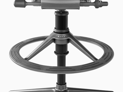 Detailed view of the footrest on a dark gray Aeron Stool.