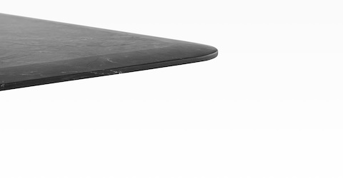 Close view of the tapered edge around the top of a black AGL table. Close view of the tapered edge around the top of a black AGL table.