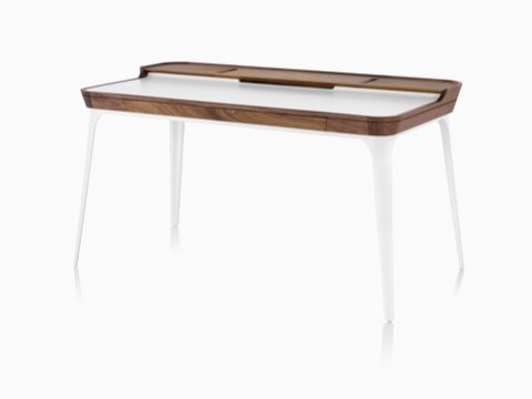 Modern Airia home office desk in white with dark wood trim and white legs, viewed from an angle. Modern Airia home office desk in white with dark wood trim and white legs, viewed from an angle.
